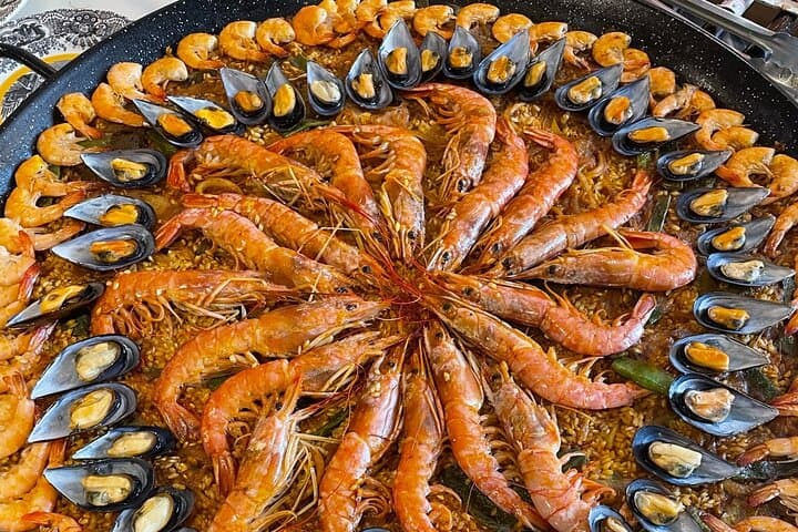 Seville: Rooftop Paella Showcooking and Sangría