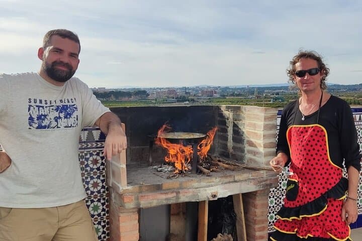 Traditional Valencian paella, cooked with orange wood.