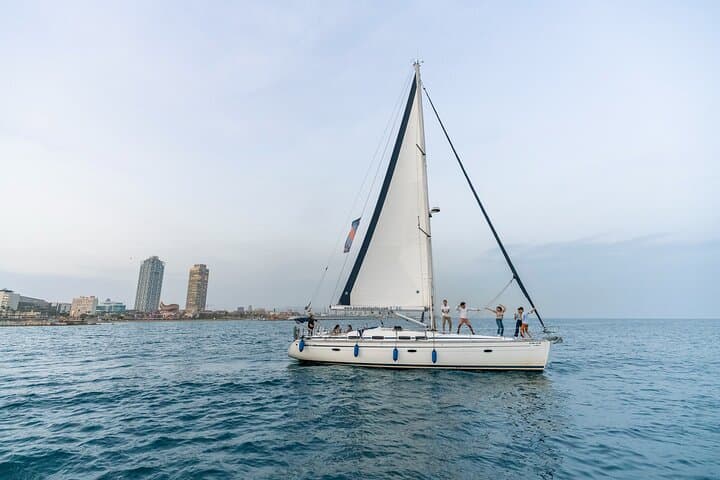 Barcelona : Private sailing cruise with open bar and pica pica