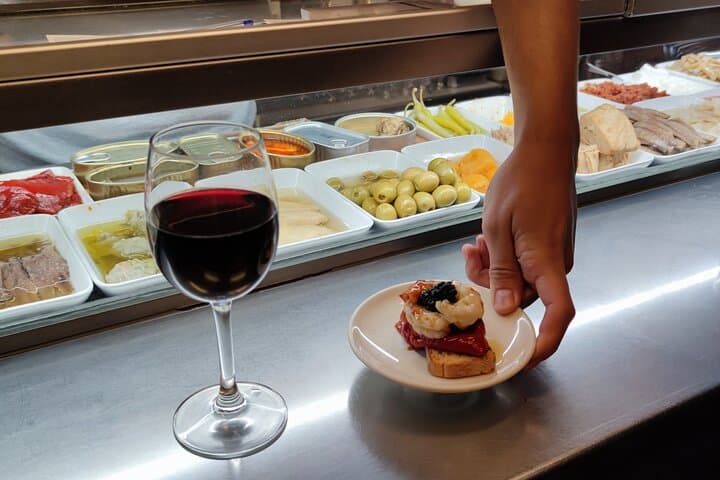 Barcelona Spanish Wine and Tapas Tour in a Local Neighborhood