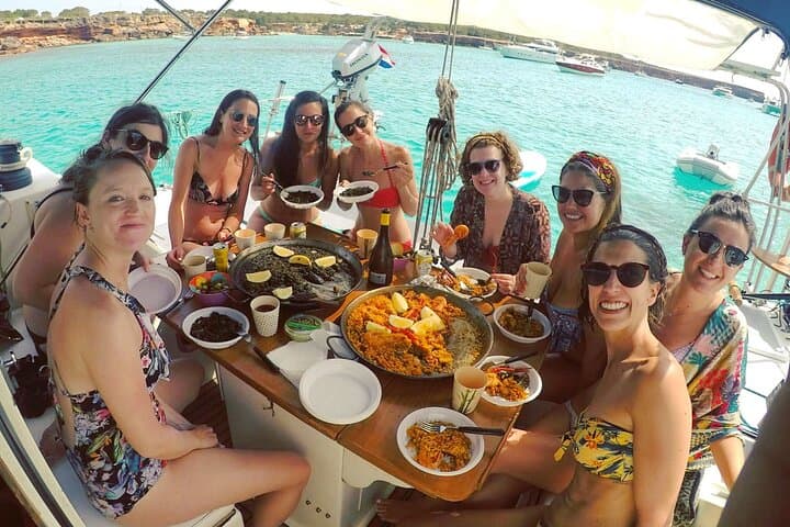 Happy group of friends eating at our wide table