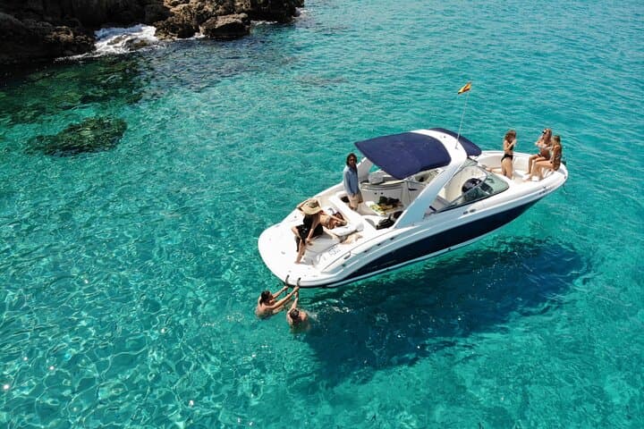 Private 7-hour boat ride from Sant Antoni de Portmany