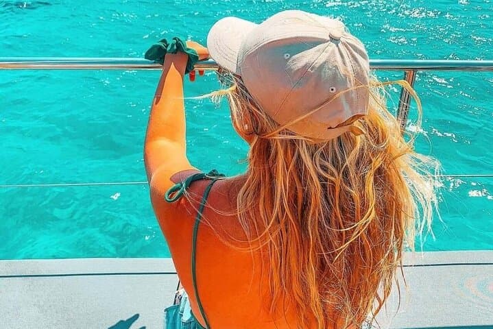 A day on catamaran Portitxol Island with food and bath from Denia