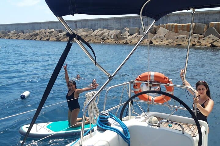 Private sailing and paddlesurfing tour with skipper up to 11 people
