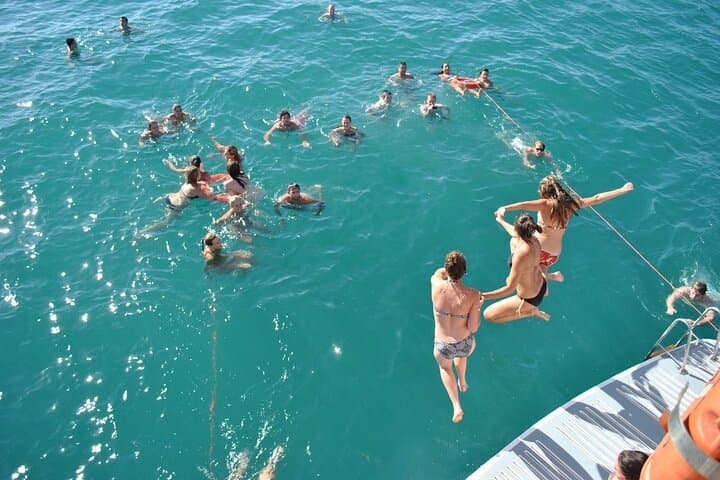 A day on catamaran Portitxol Island with food and bath from Denia