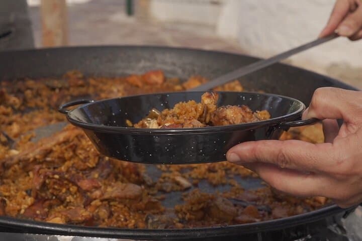 Valencian paella experience and visit to a private winery