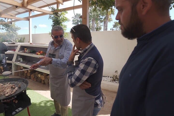 Valencian paella experience and visit to a private winery