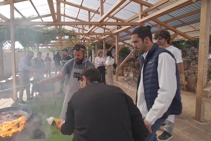 Valencian paella experience and visit to a private winery