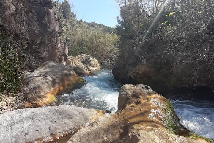 Sightseeing Tour in Port Saplaya, Sant Josep, and Waterfalls