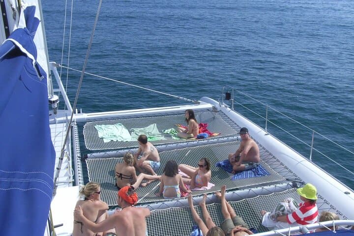 Catamaran cruise with drinks, food and swimming stop