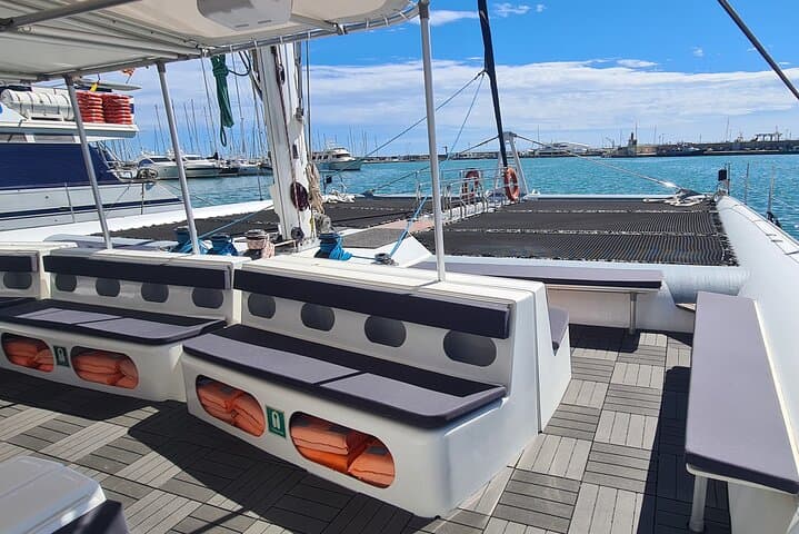 Catamaran cruise with drinks, food and swimming stop
