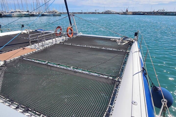 Catamaran cruise with drinks, food and swimming stop