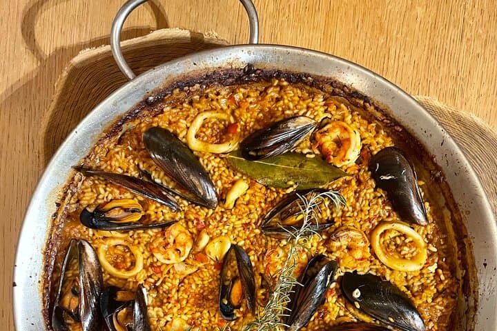 Private Cava Sabrage and Paella Class in Barcelona
