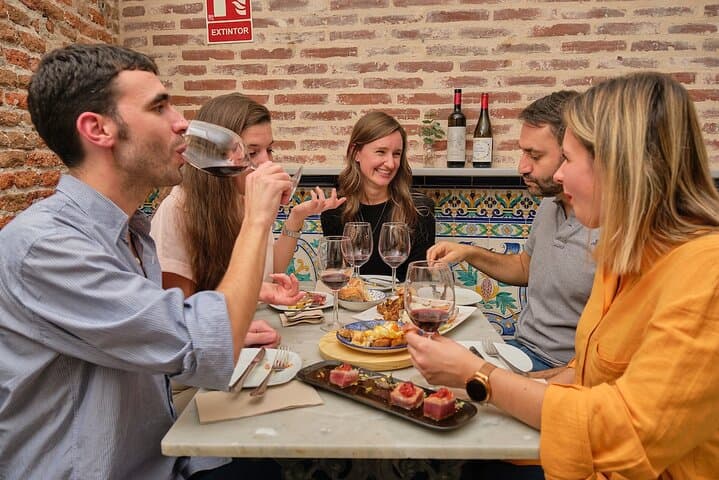 Feast on a hearty dinner across 4 tapas bars in the trendy Malasaña neighborhood.