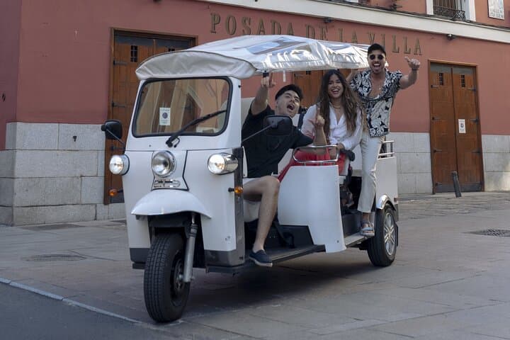 "Madrid: Panoramic views in Tuk Tuk with pickup available"