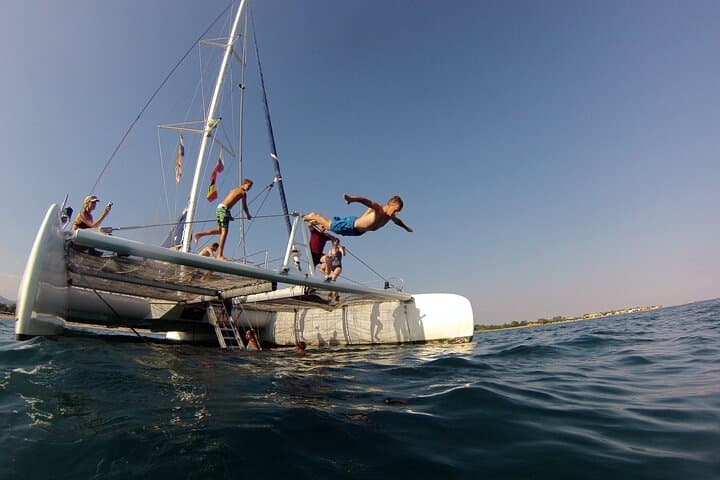 Catamaran cruise with drinks, food and swimming stop
