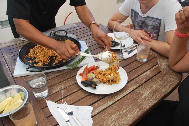 Market Tour & Paella or Fideua Cooking in Nicole's Barcelona Home