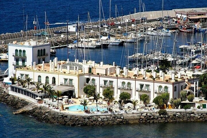 Visit Puerto de Mogan and Its Market with One Way Boat Ride