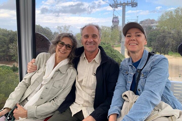Tourists and guide on the Montjuïc cable car, Barcelona