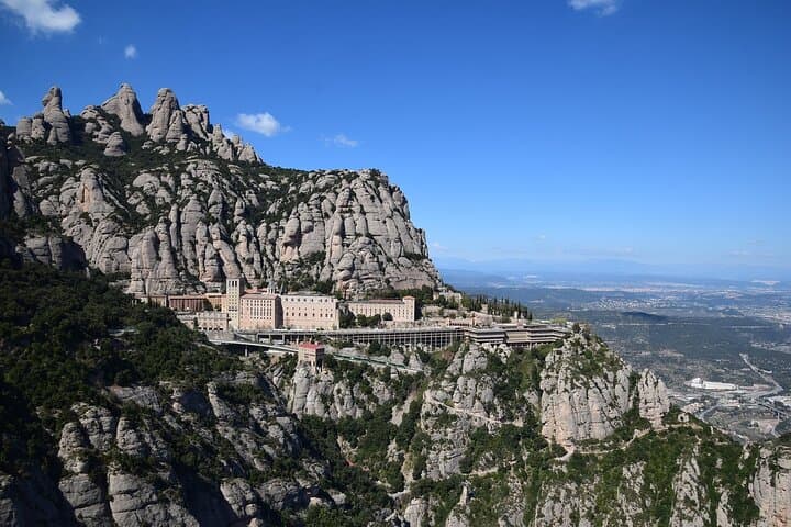 The monastery and mountain of Montserrat seen from the St. Miquel cross