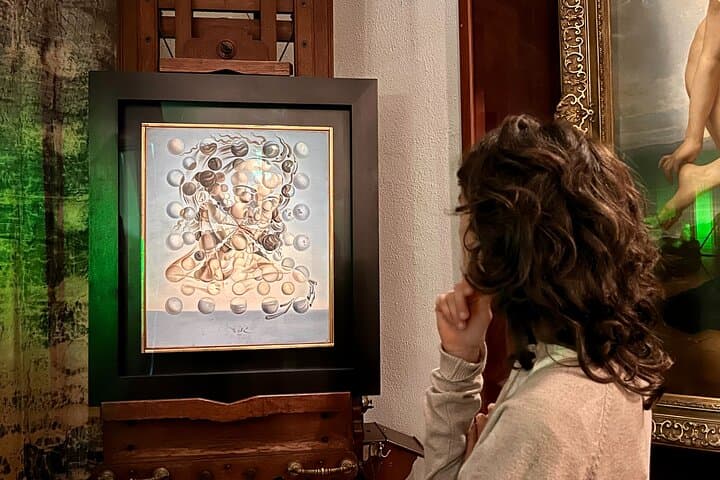 Visitor admiring one of Dalí's masterpieces