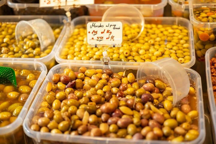 Malaga Food Tour with 12+ Tastings: Tapas, Olive Oil, Ham & More