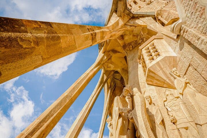 Gaudí’s Passion Façade reveals a dramatic play of light and shadow, where sculpted stone captures the raw emotion and intricate storytelling of this architectural wonder.