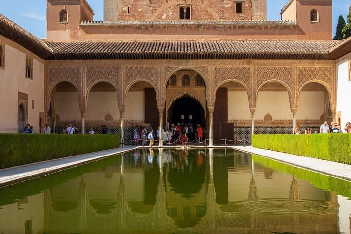 Enjoy a breathtaking panoramic view of the Alhambra with the Sierra Nevada in the background.