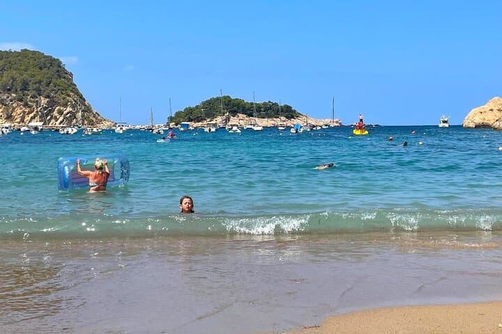 A picturesque beach where you can swim and soak in the natural beauty of Ibiza.