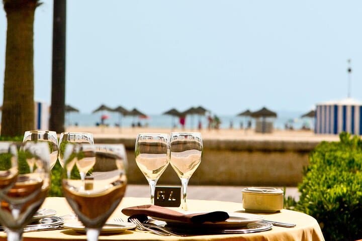 Stand Up Paddling Boarding Tour and Paella Lunch in Valencia