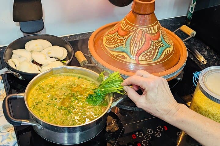 Adding Cilantro To the Harira Soup