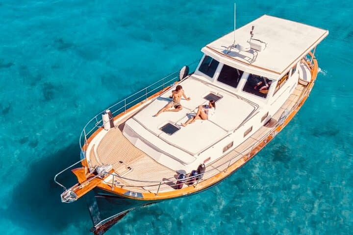 Our Daycharter boat is 12.5m 42ft and has a changing room and bathroom