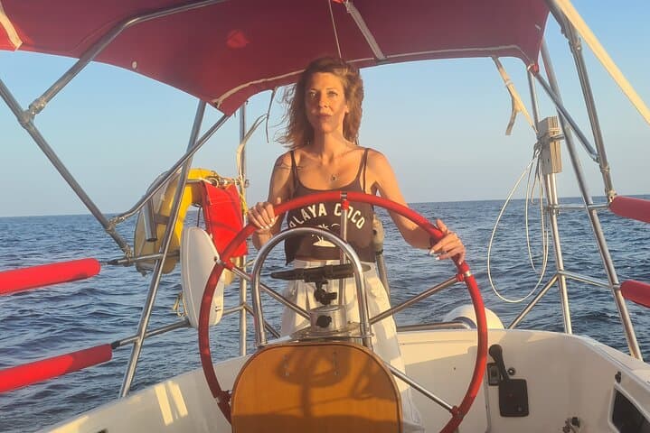Girl in Red Sailboat