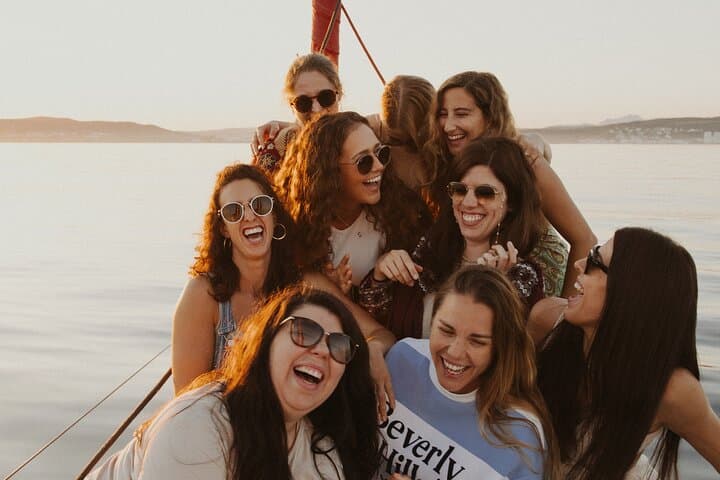 Group of Friends renting sunset on sailboat in Sotogrande