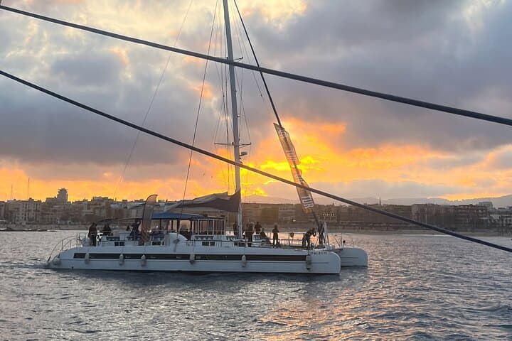 sunset in Catamaran Barcelona