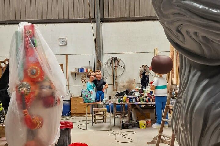 You will visit an authentic workshop full of works by Fallas artists