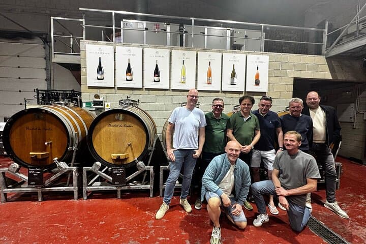 Winery and barrels with group