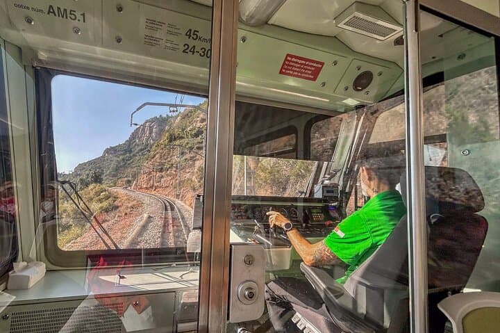 Hop on the cogwheel train and enjoy stunning views as you ascend into the heart of Montserrat.