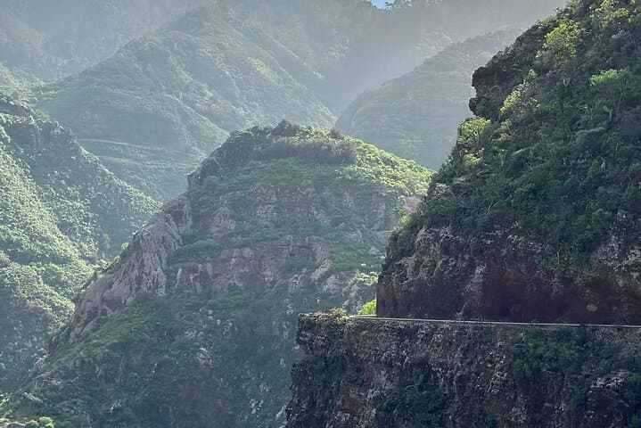 This horizontal line across the cliff face is a former water channel (acequia) that forms part of our hiking route.