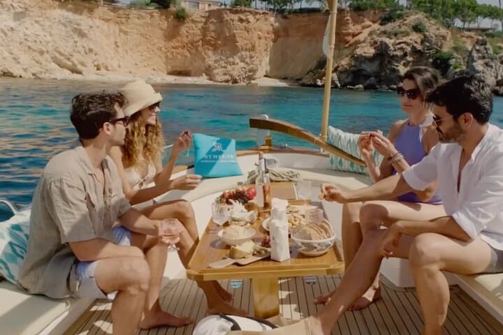 Sail on an electric Majorcan llaut from Puerto Portals
