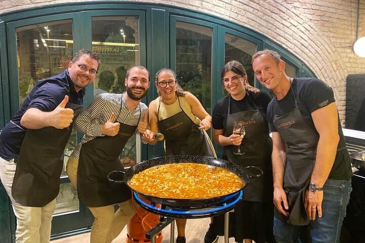 Learn to cook authentic paella and tapas with professional chefs in a small-group workshop.