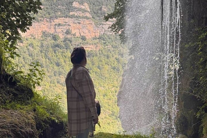 Trip from Barcelona: Mountains, Waterfall & Cliffside Monastery