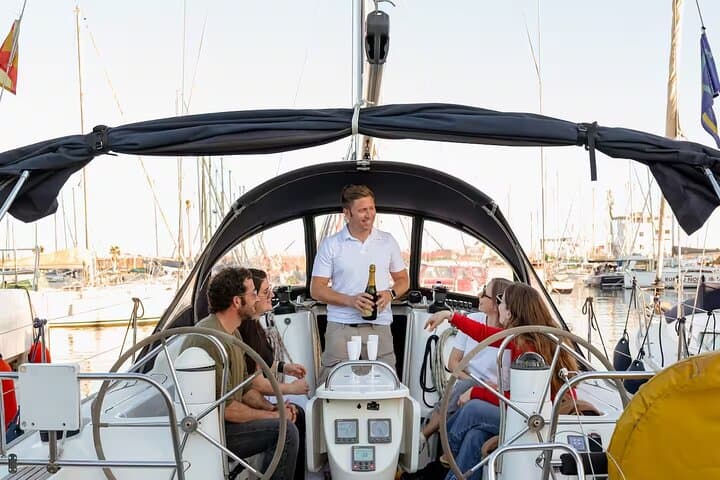 Sunset boat trip with open bar of cava (local champagne)
