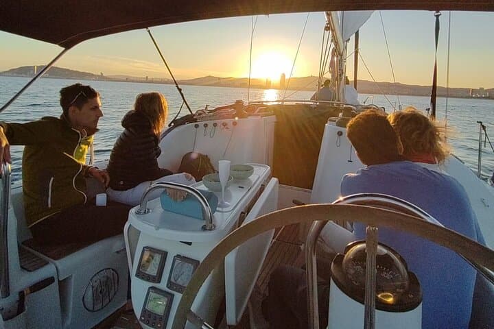 Sunset boat trip with open bar of cava (local champagne)