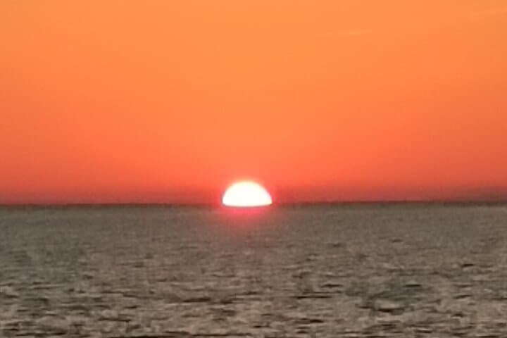 Sunset sailing along the cliffs of Maro- Private