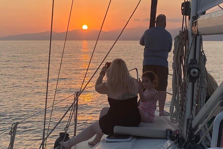 Sunset sailing along the cliffs of Maro- Private