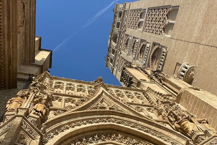 tand beneath Seville Cathedral and La Giralda to experience the grandeur of these famous landmarks.