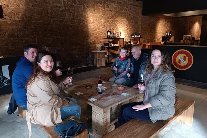 Guests enjoying the wine tasting during the tour