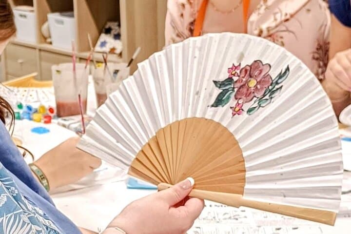 Learn traditional fan-painting techniques from a local artist