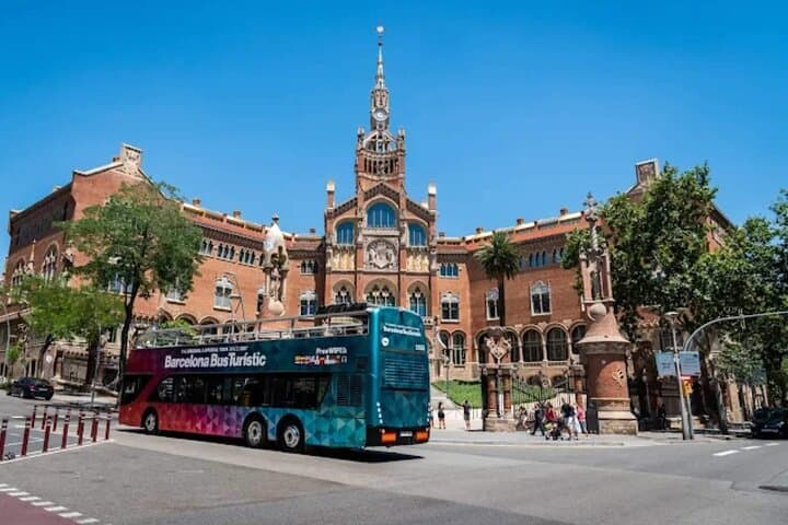 Tourists peacefully drive around Barcelona, admiring colorful streets and iconic sights from above
